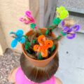 Peinado loco de maceta con flores para niña
