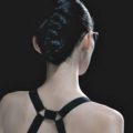 rear view of a female fashion model with french braided tuck hair