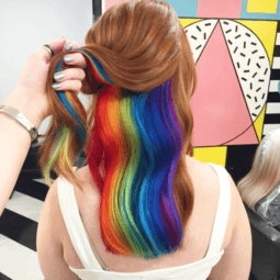 the cool hidden rainbow hair color trend