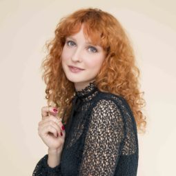 red curly hair with bangs medium-length