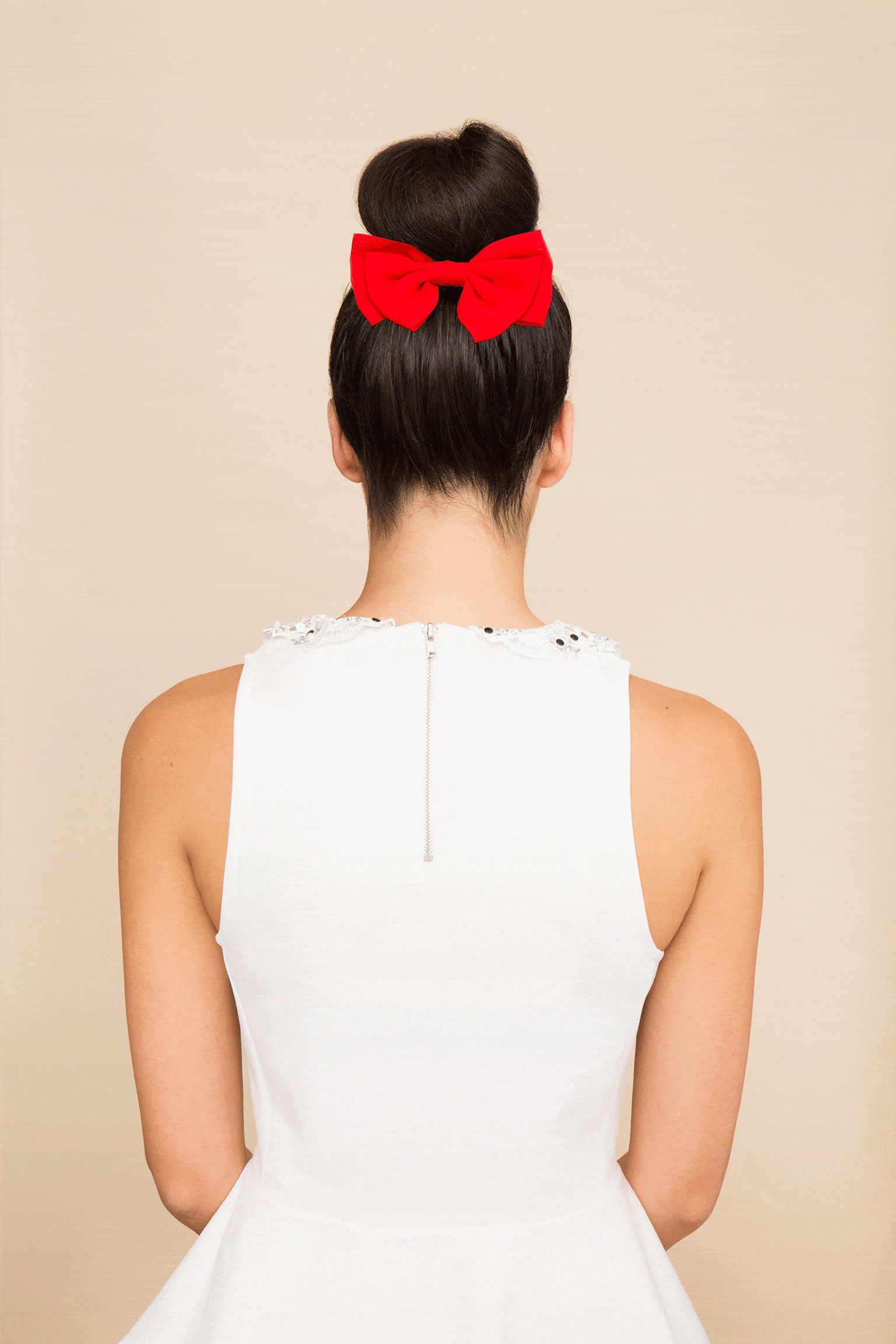 updo with bow top knot gif