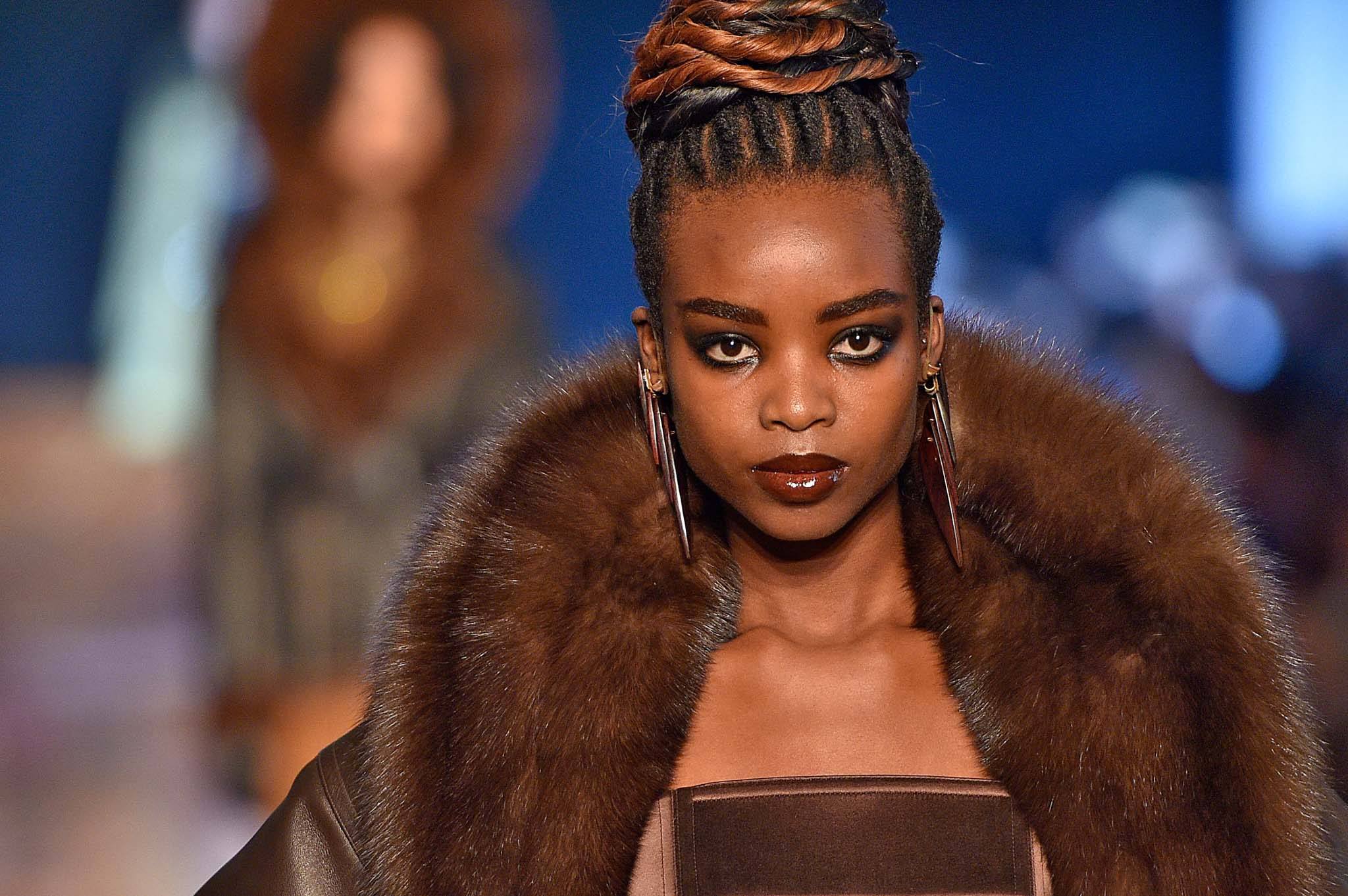 dreadlock hairstyles chic bun