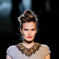 young model with French roll hairstyle date night hair ideas