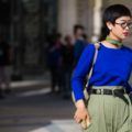 woman with short hair and glasses