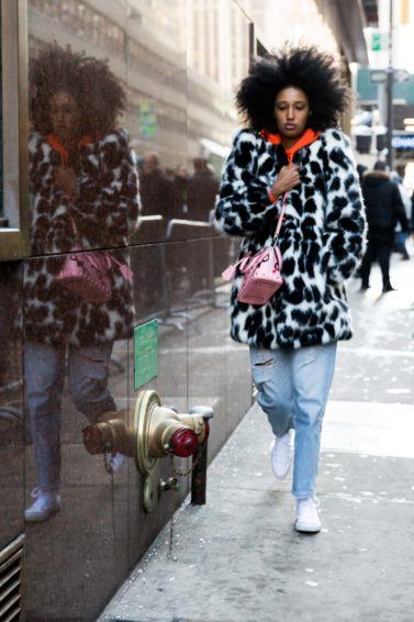 woman wearing furs and curls trend during NYFW