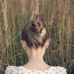 after-party hairstyles include accessorized bun looks.