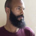 New buzz cut men's hair with a beard