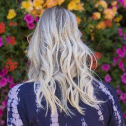 festival season hair products on long blonde wavy hair