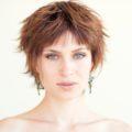 when it comes to funky hairstyles for short hair, opting for a feathered pixie as demonstrated by this istock model is great