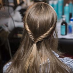 sleek hair trend for spring with hair twists