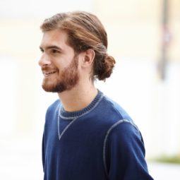 thick hair man bun ideas with a low knot