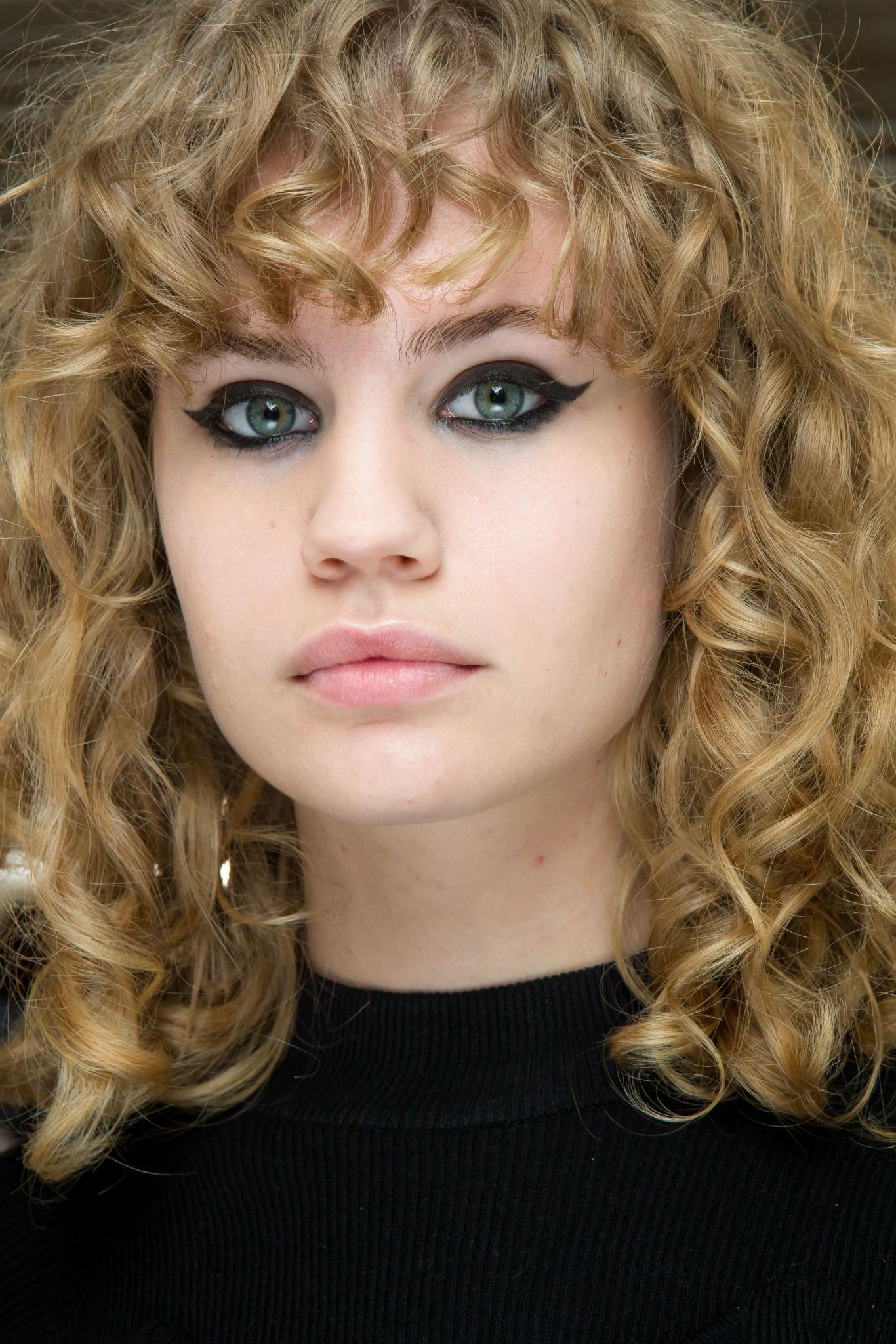 curly a-line with bangs cut