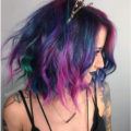 peacock tones on purple hair