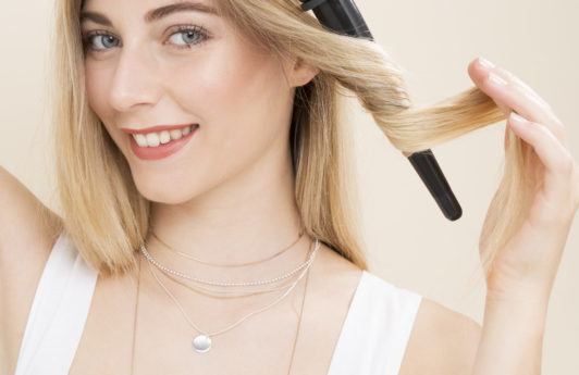 half-up braided: create waves with curling wand