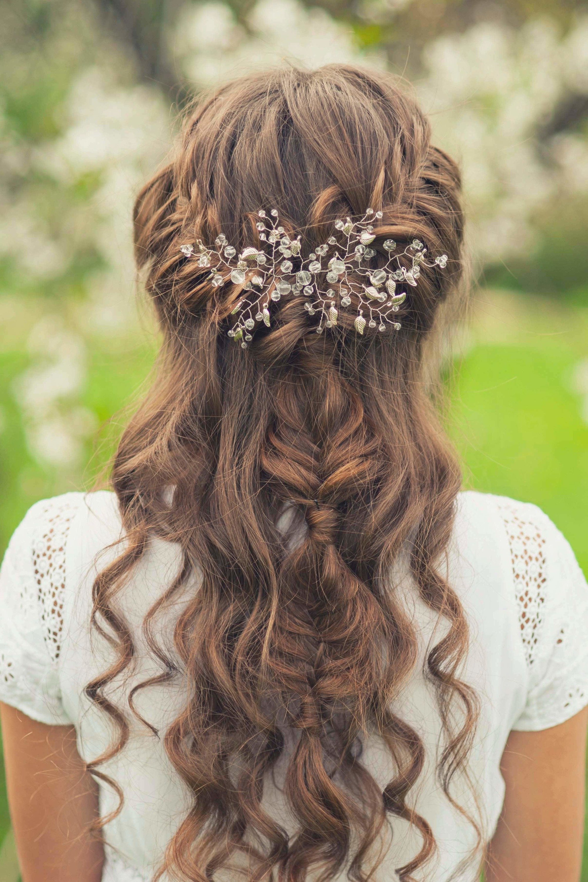 fishtail with sprigs half up half down wedding hairstyles