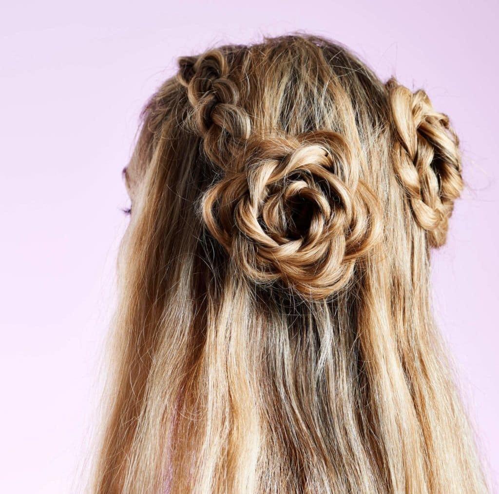 flower braided buns half up half down wedding hairstyles