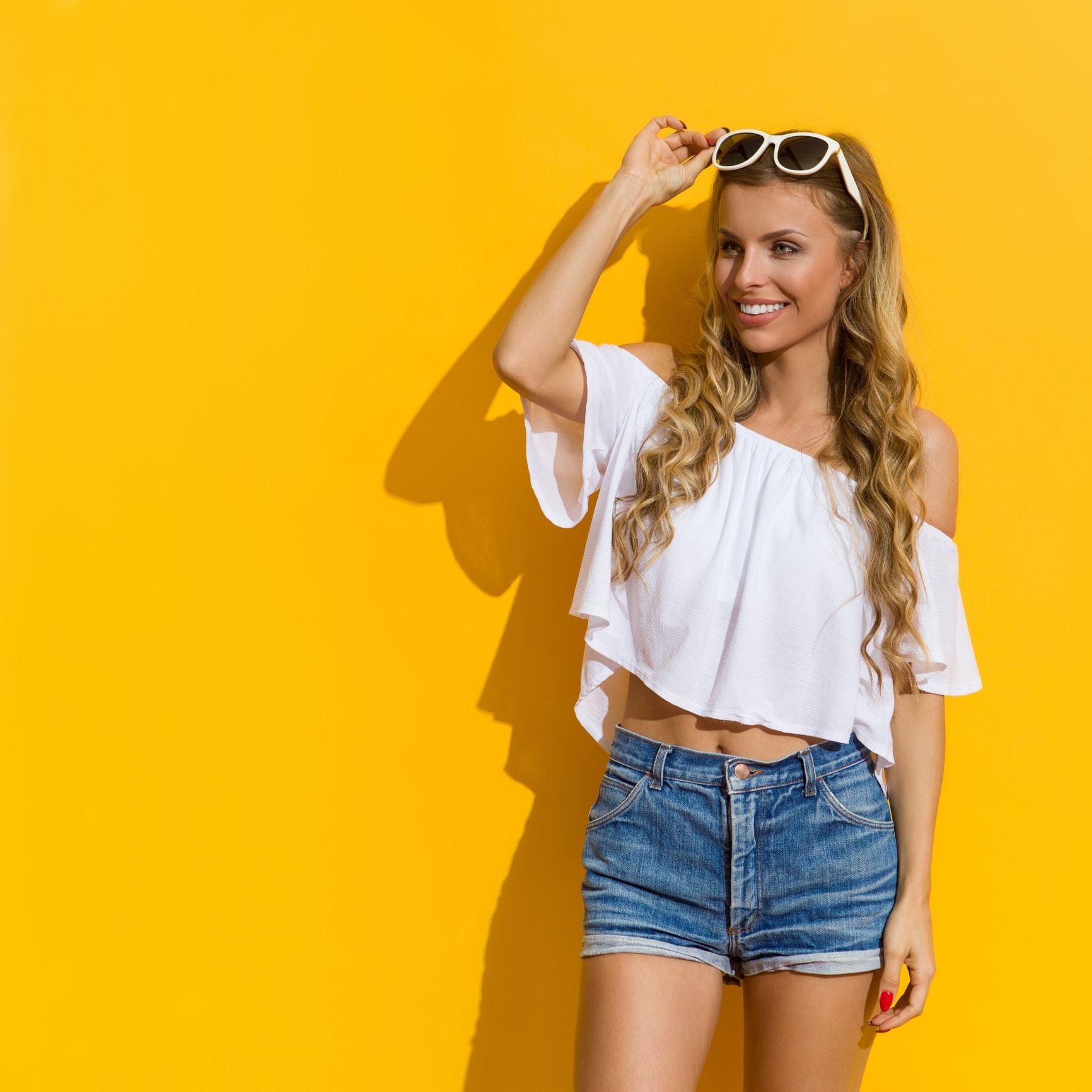 loose perm honey blonde long curls