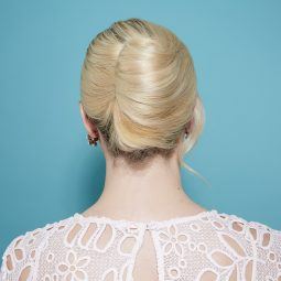 Blonde woman with a French twist updo