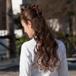 rear view of woman with bantu waterfall bantu knots hair outdoor