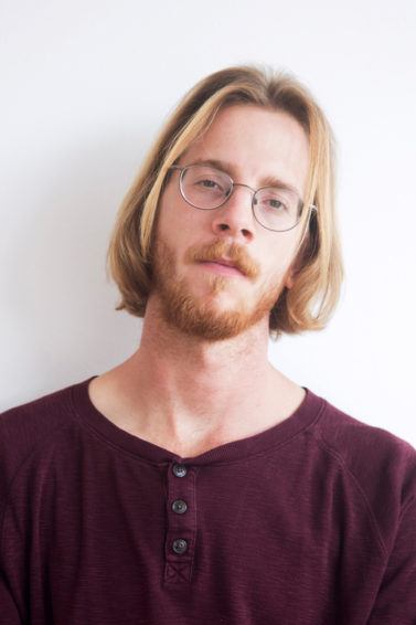 mens medium to long hairstyles middle part