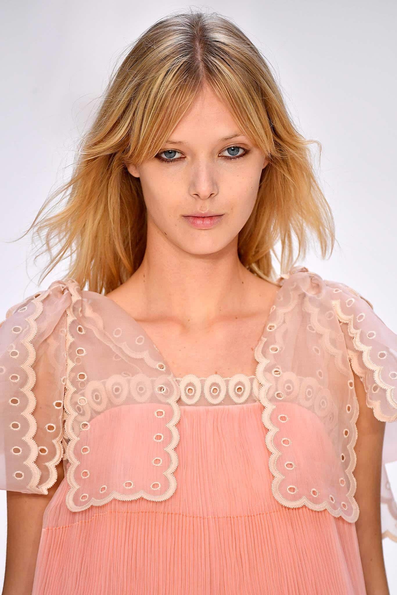 medium short hairstyles lob with center part.
