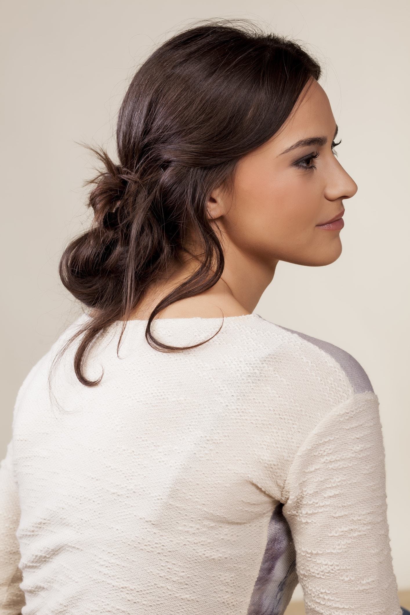 coiffed loose brunette piece-y updo