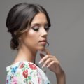 coiffed volumized low updo brunette