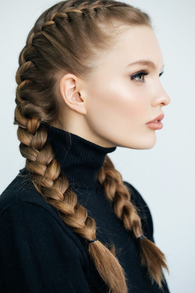 Two braids against the backdrop of the city, a hairstyle from th Stock  Photo - Alamy