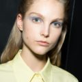 parted half updo blonde