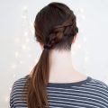 female undercut long hair braided ponytail
