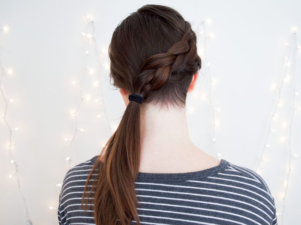 female undercut long hair braided ponytail