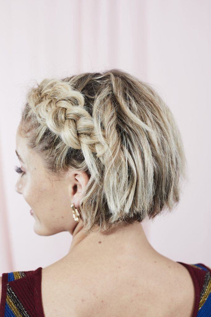 girl with blonde hair and dutch braid