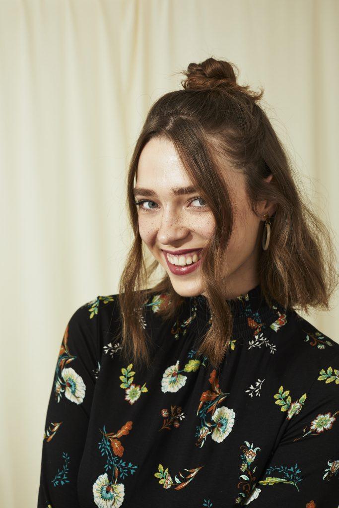 girl with short hair with face-framing pieces