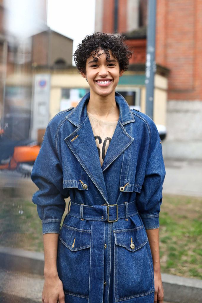 girl with curly shag pixie cut
