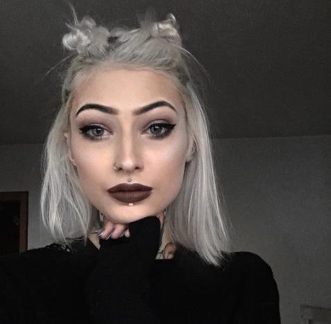 girl with gray hair and space buns