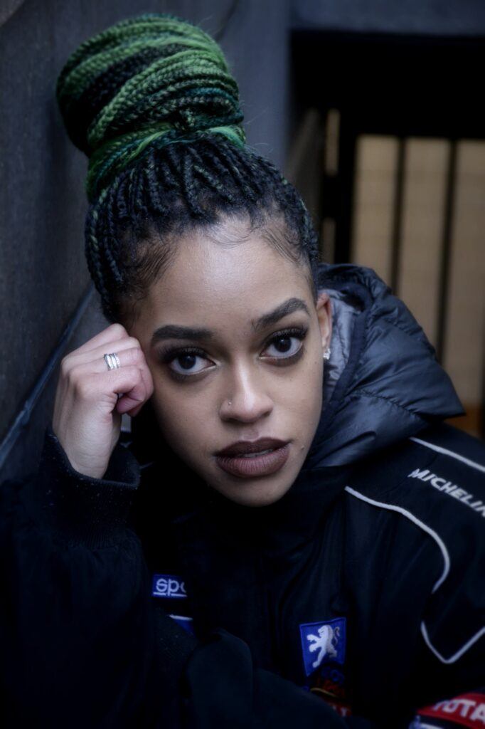 girl with green yard braids