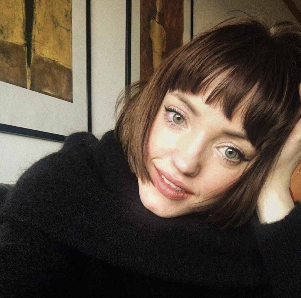 girl with straight French bob and bangs