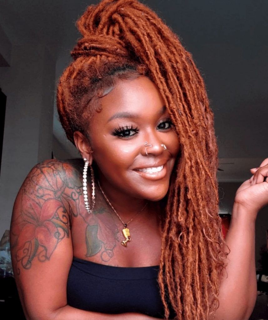 girl with copper auburn dreadlocks