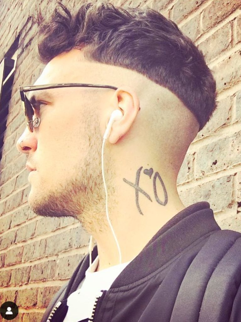 Man with fusey hair cut.