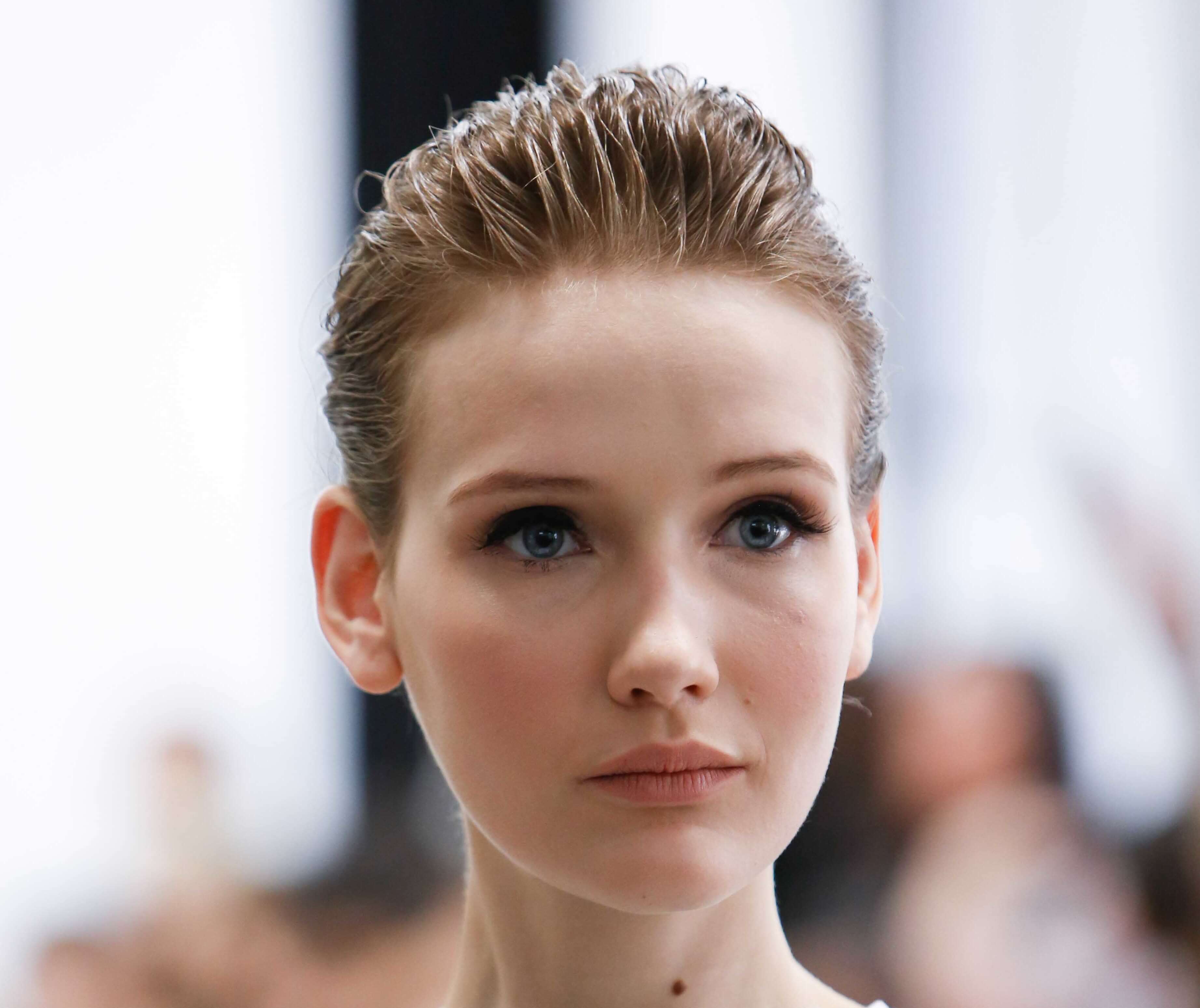 slick pull back hairstyle for short hair