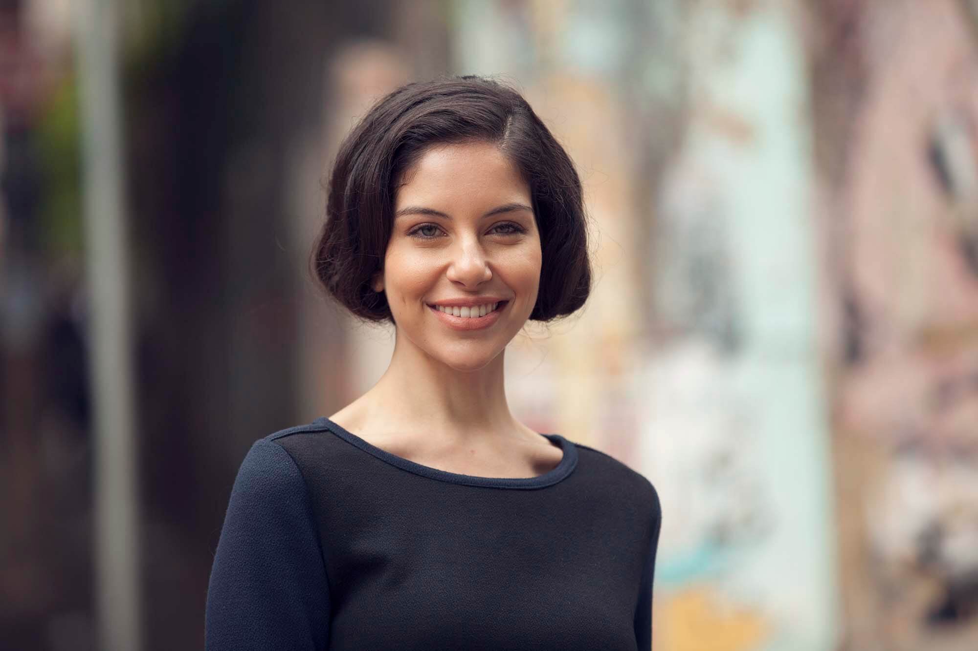 brunette smiling with faux bob hairstyle