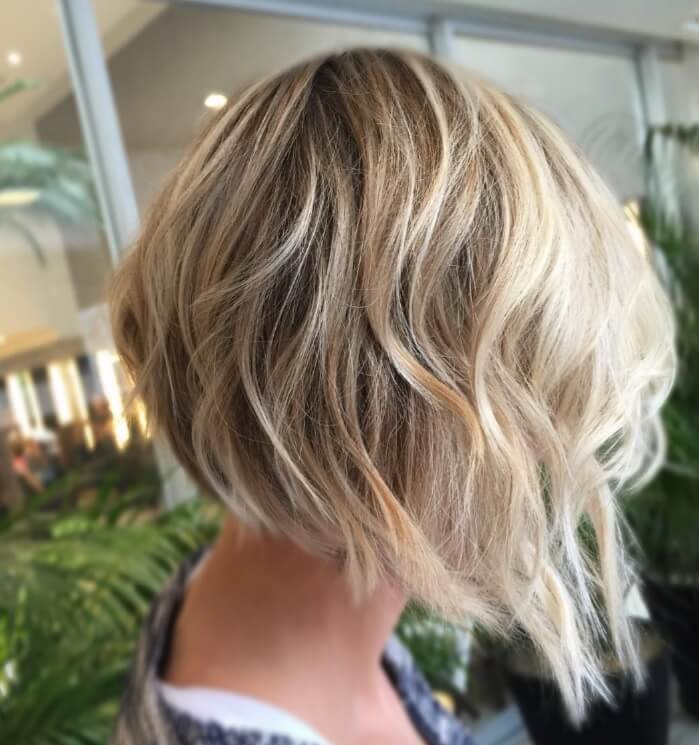 Blonde slightly wavy inverted bob