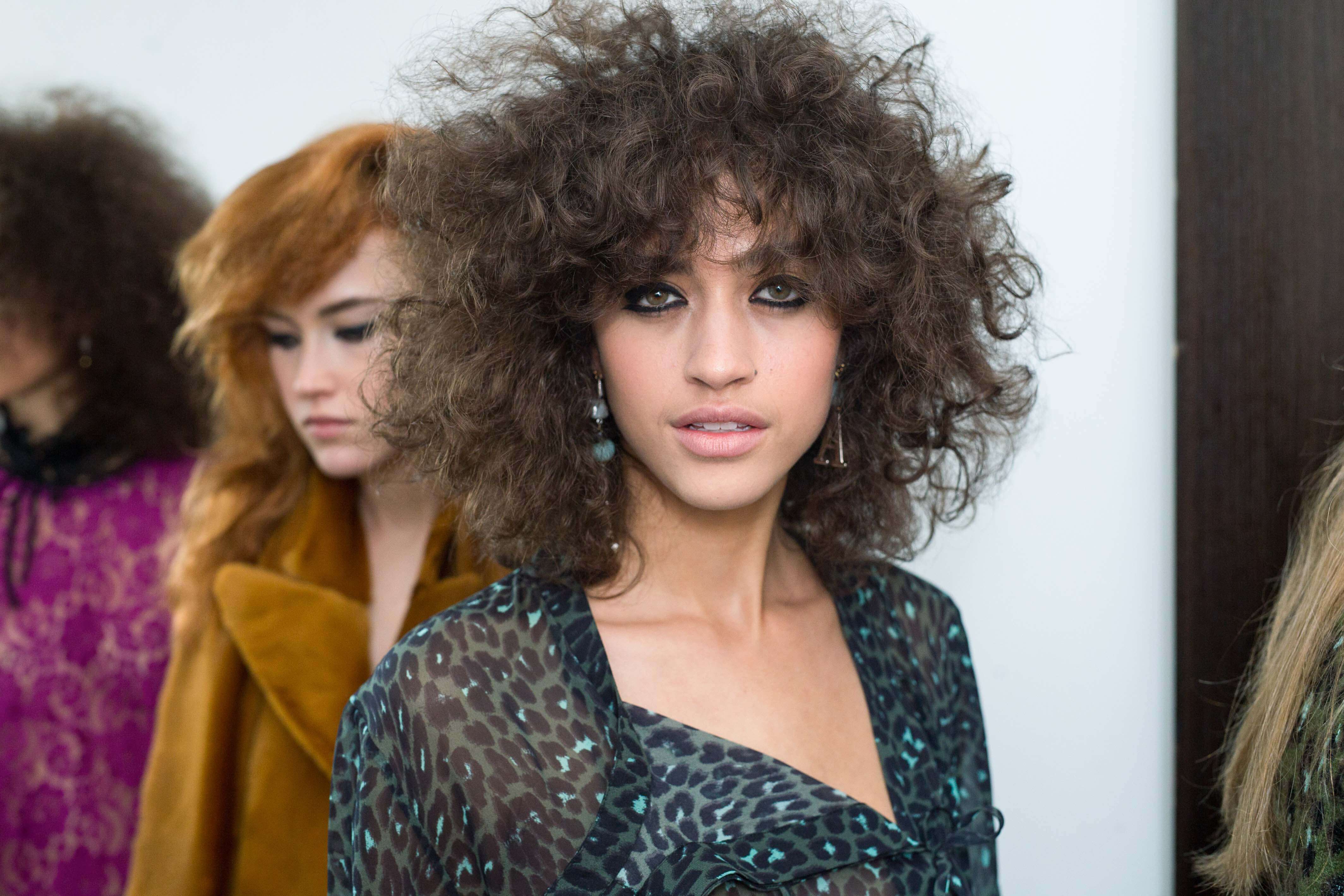 naturally curly hair with layers
