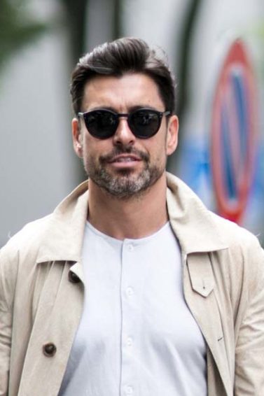 Dark haired man with medium quiff