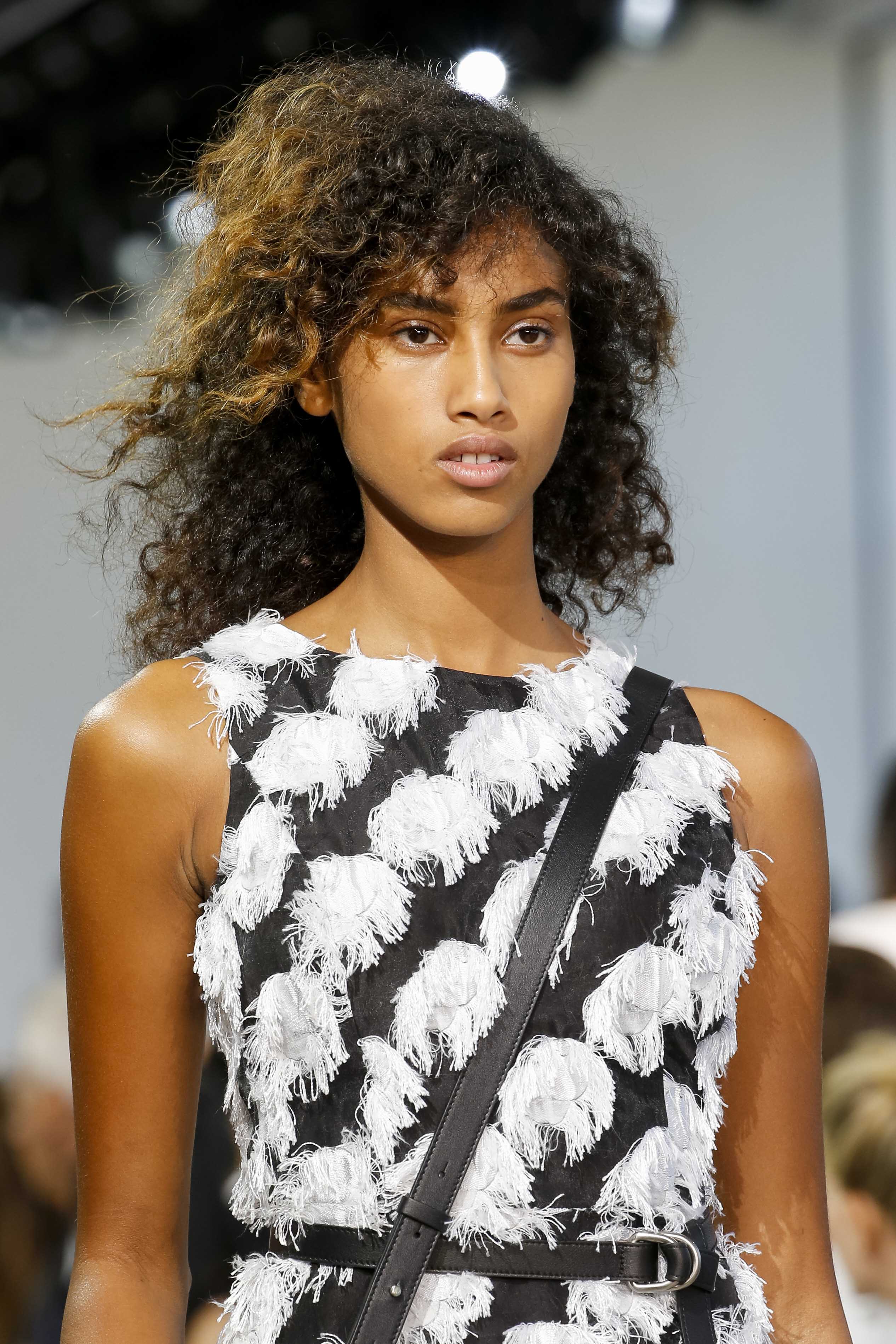 long layers haircut: bouncing layered haircuts with curly natural hair