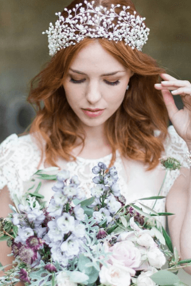 Bridal hair: redhead woman with vintage crown hairstyle