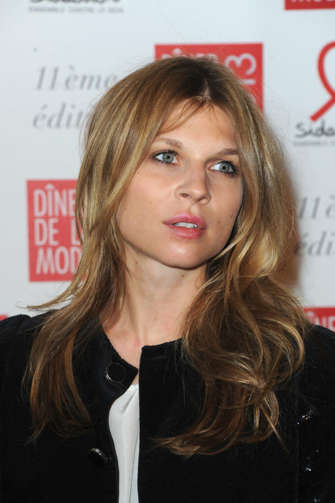Clemence poesy with long dark blonde hair