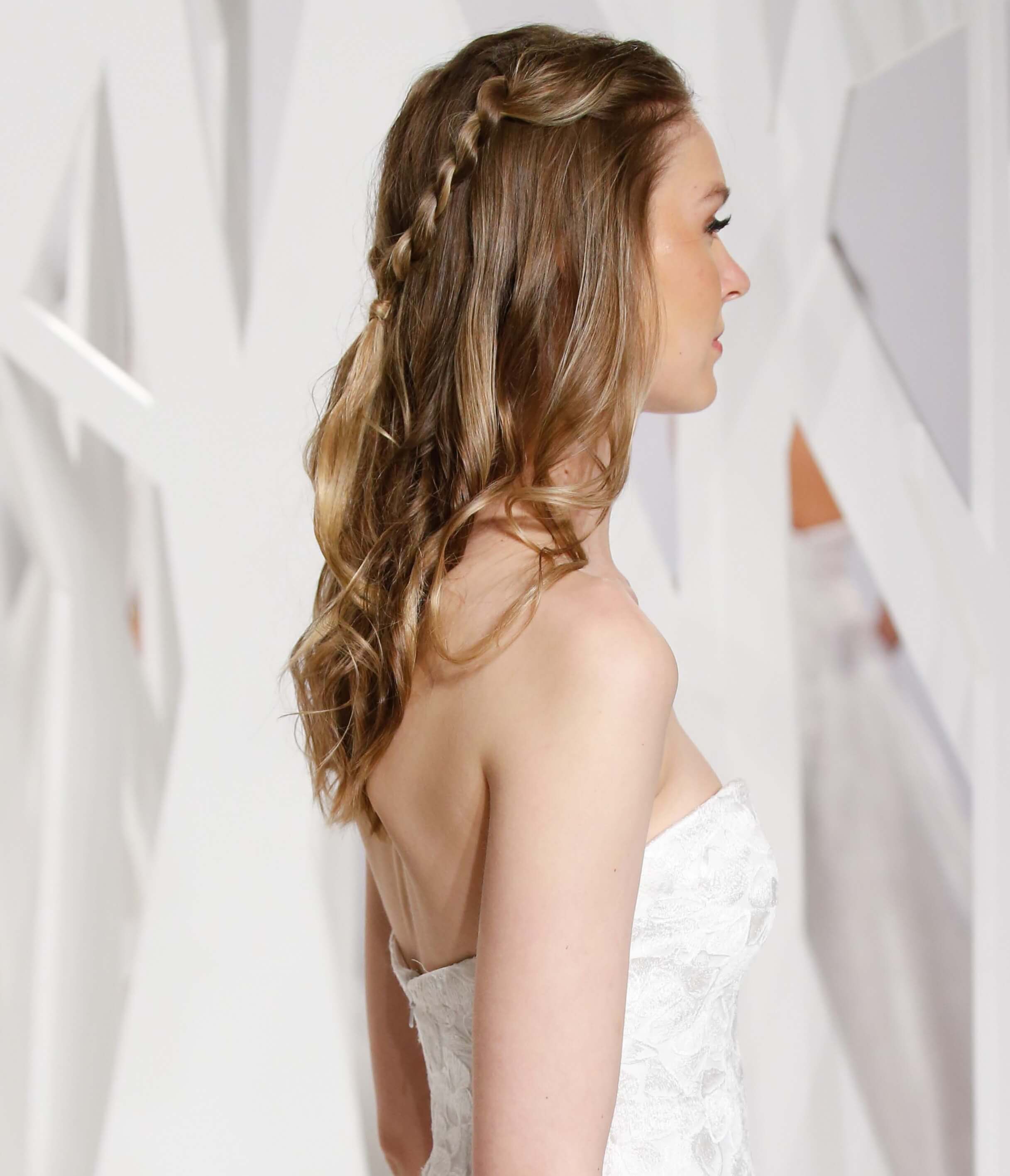 easy wedding style for curly hair: A blonde curly half-up twisted hairstyle
