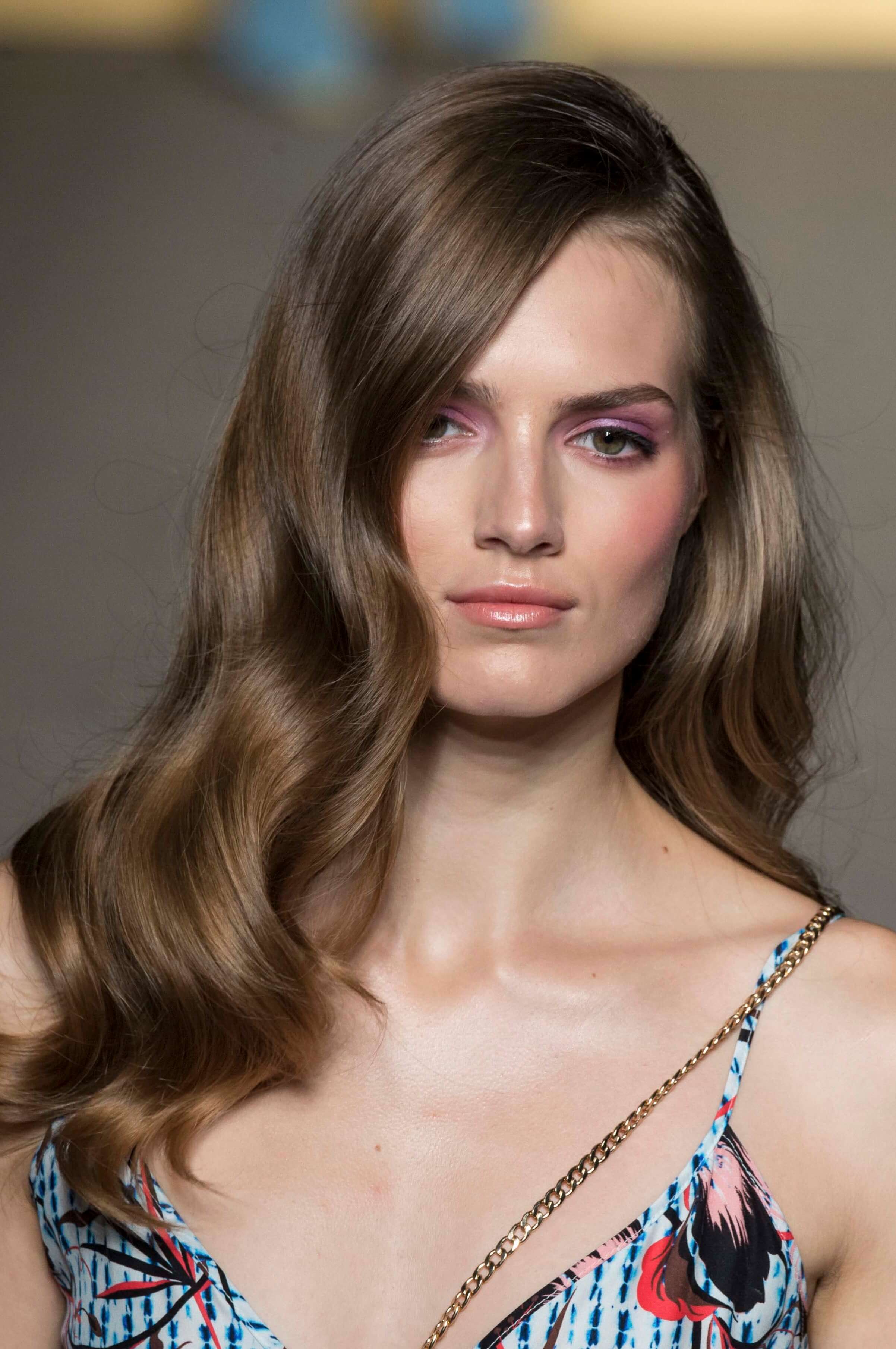 long layered haircuts on shiny brown hair model