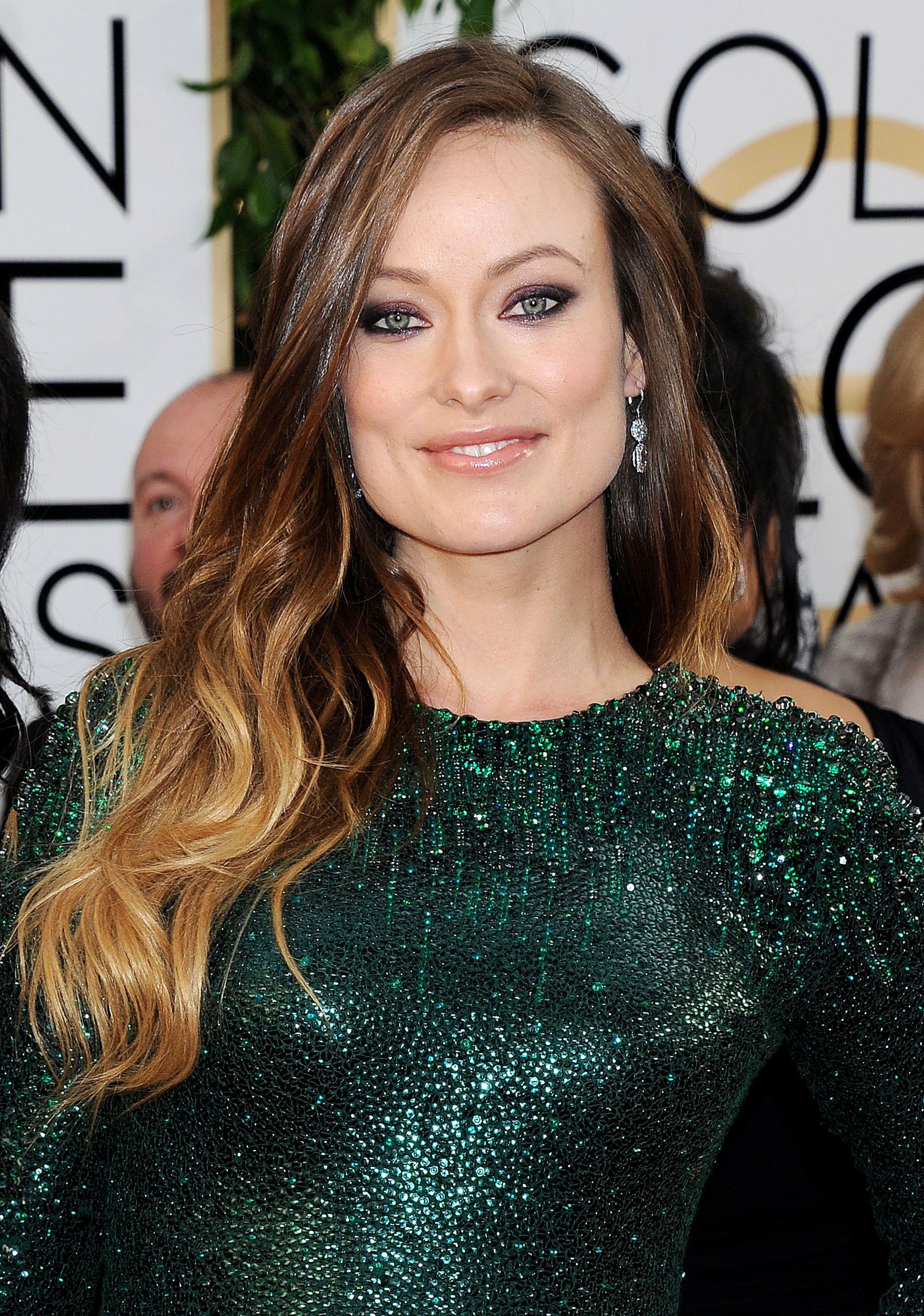 olivia wilde with long curly warm golden brown ombre hair